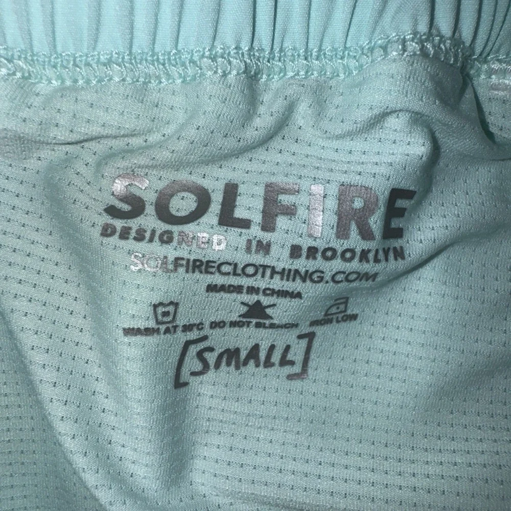 Solfire Peloton Athletic Shorts Men Small Light Blue Reflective‎ Graphic Active